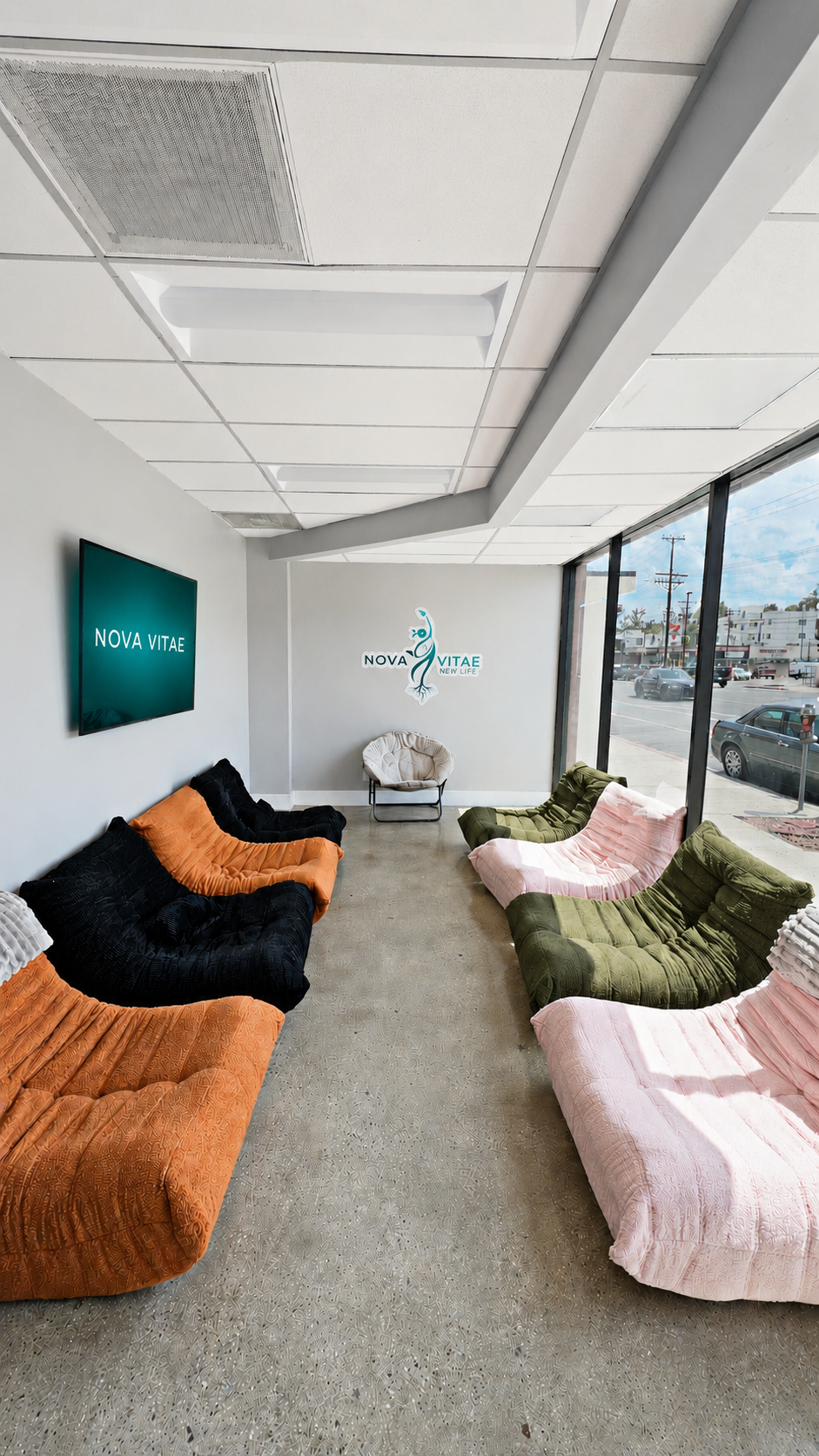 Nova Vitae group therapy room with colorful couches arranged for connection